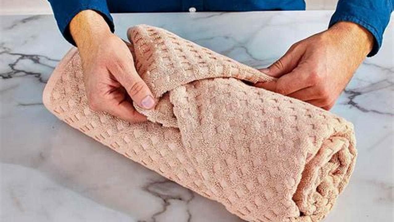 How To Roll Bath Towels