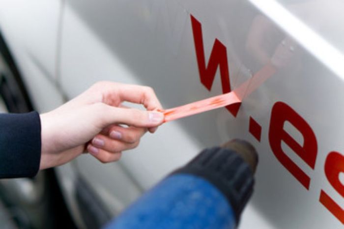 How to remove adhesive from car paint