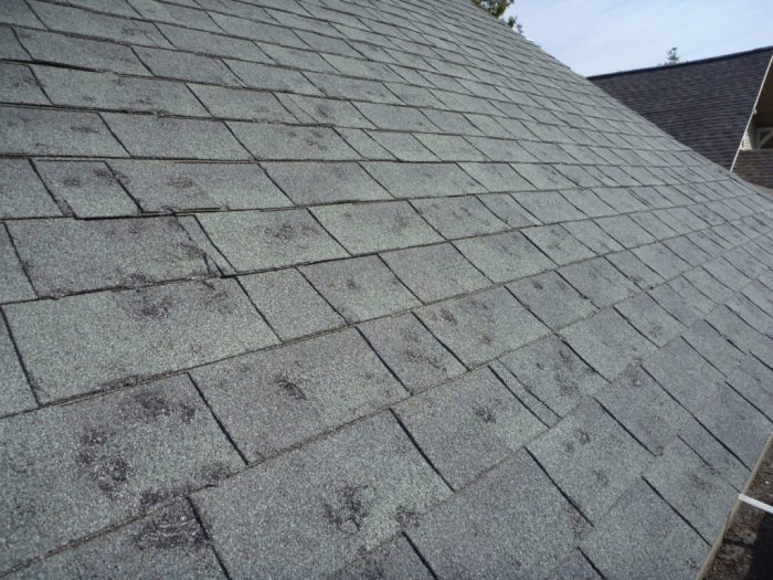 How much hail damage to replace roof